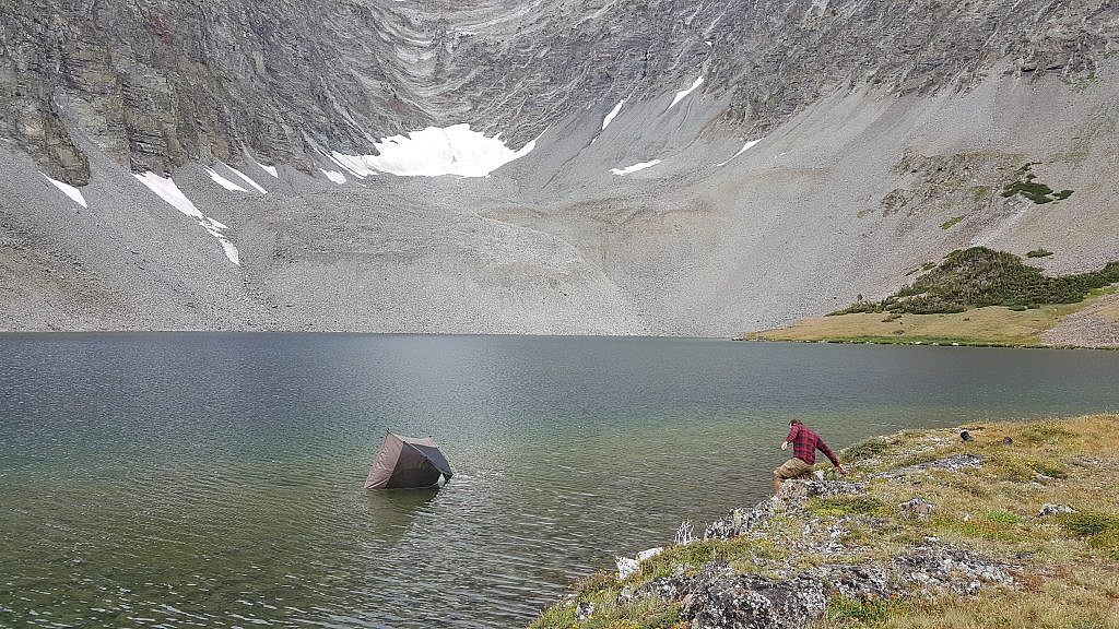 This is not something you see everyday. Right as I de-staked my tent a gust of wind blew in at the perfect angle and sent my tent tumbling into the lake.