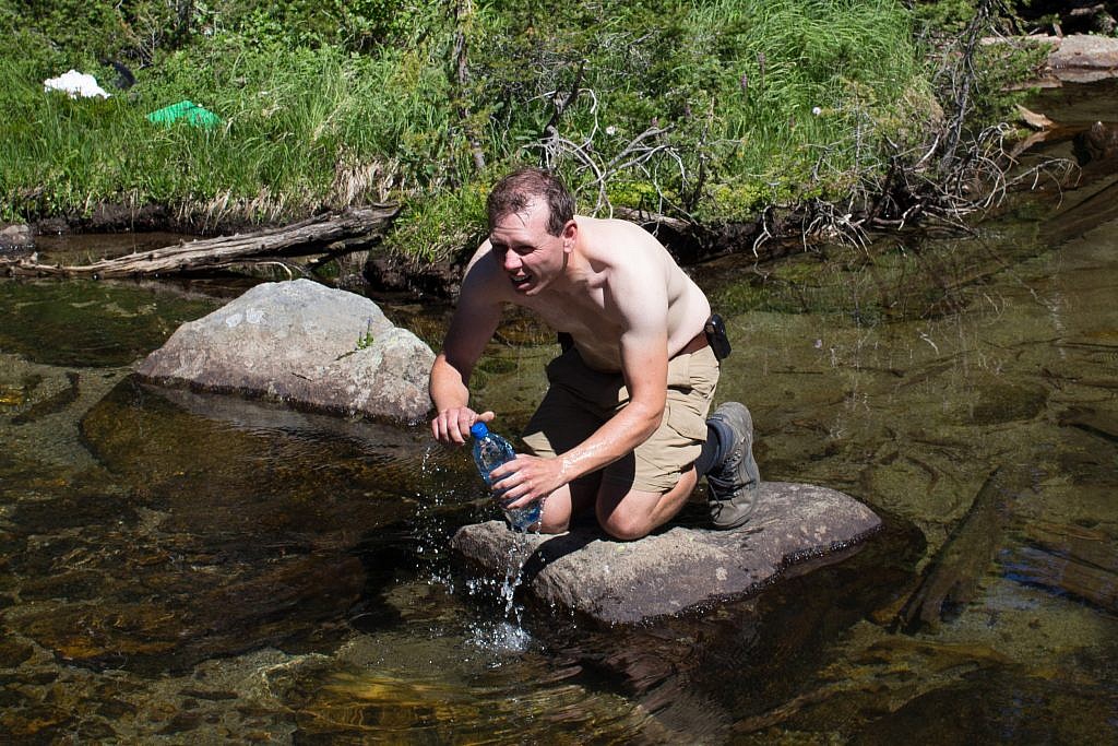 Me collecting a water sample from Upper Twin Lake for Adventure Scientist’s Global Microplastics Initiative.