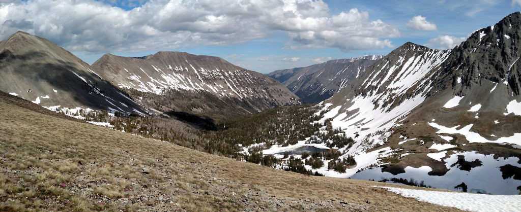 Looking east from the saddle. The Sunlight Lake Trail follows the valley.