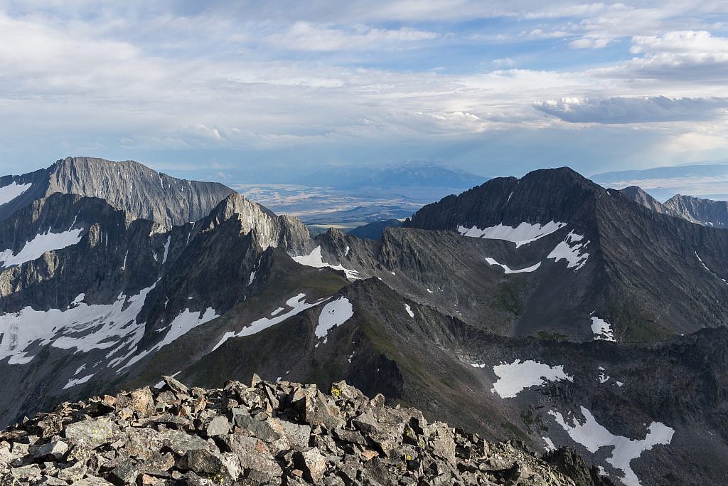 Looking south from the summit. Iddings Peak (10,936′) on the left and Wilsall Peak (10,571′) on the right. Absarokas in the background.