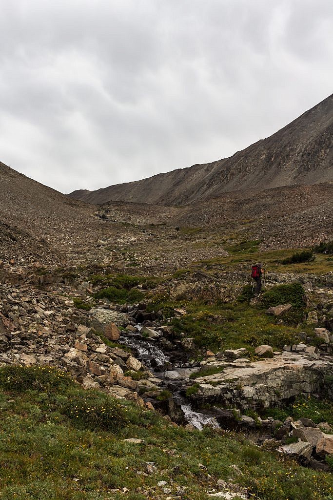 After an hour or so of scrambling we finally made it around the ridge and began climbing up towards the drainage towards the unnamed lake.