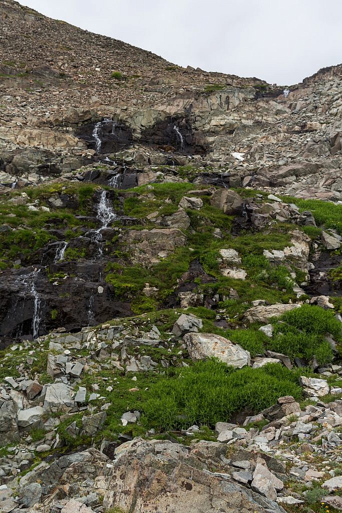 Beautiful waterfalls cascading from the lake above.