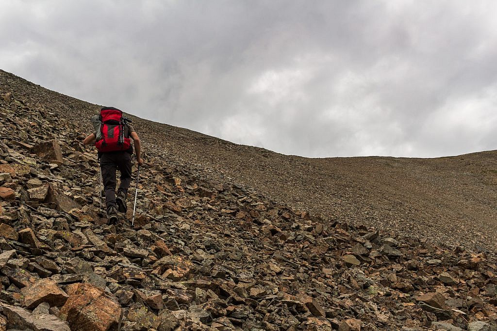 More scree scrambling. Ominous clouds were blowing in.