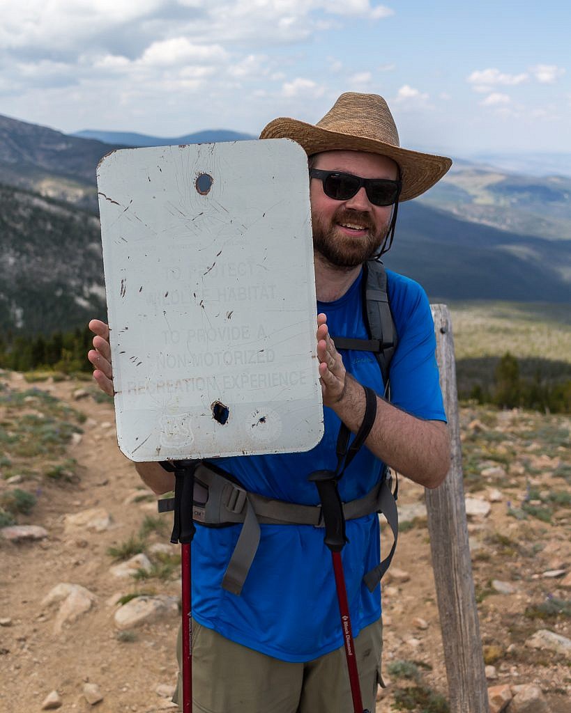 A broken down sign at the saddle. Here you ditch the trail, which descends to Edith Lake, and climb the moderately steep ridge to the east all the way to the summit.