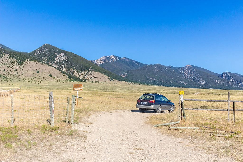 This is the BLM gate. From here travel another mile or so to a flattish area where you can park.