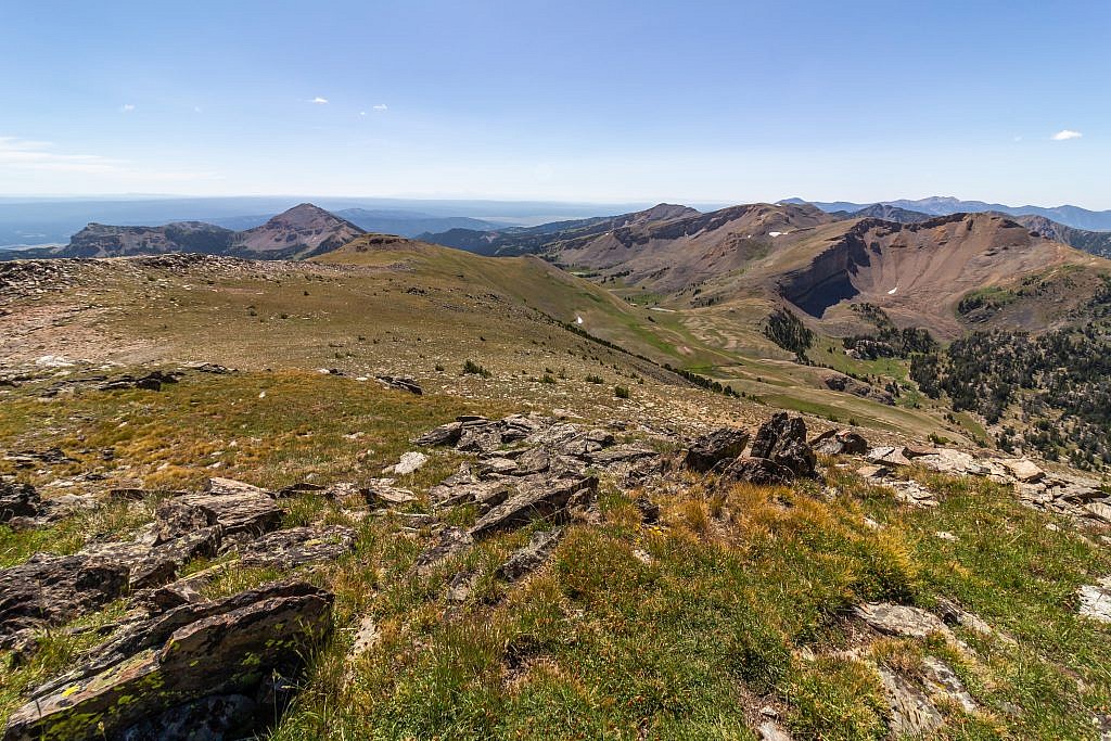 Looking south from the summit. This terrain looks super fun to explore and I believe the other routes approach from this direction. The Montana-Idaho border is less than a mile south of here. If you look very closely you can see the Tetons in the distance.