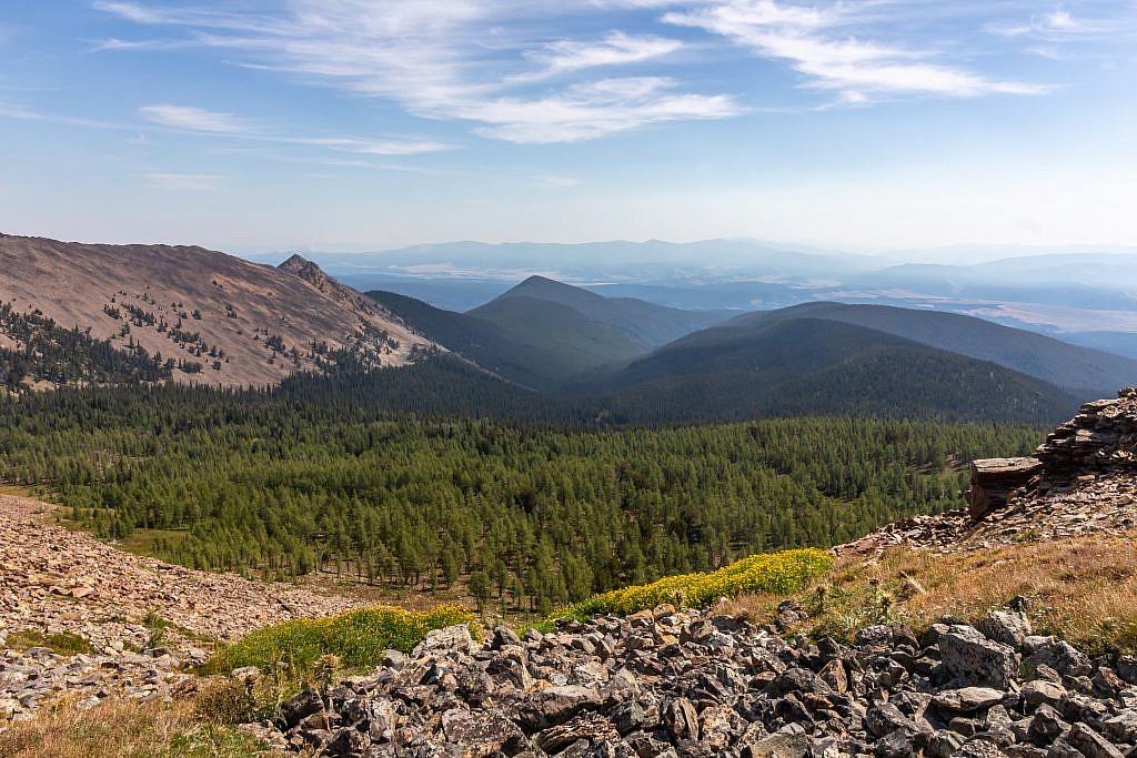 Looking back towards the saddle (right) from the edge of the Lost Lakes Basin. Trail #2129 comes in from the right and Trail #2128 follows East Fork Fishtrap Creek down the drainage in the center.