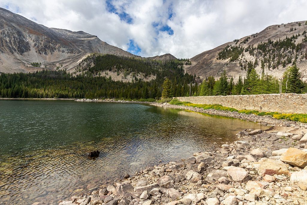 Hearst Lake. Mount Haggin is the little blip on the ridge to the left. From here follow spur trails to the west end of the lake, ascend the slopes to a small drainage, and then head south up the drainage all the way to the summit.