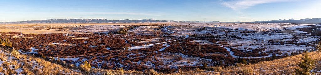 Panorama of the Big Hole Valley from a perch near the Big Hole Battlefield. Pioneer Range in the distance on the left and Beaverheads in the distance on the right.
