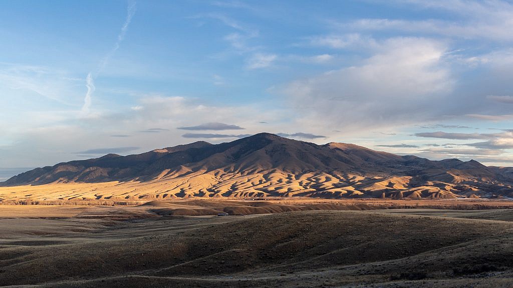 The southern end of the McCartney Mountain Range. Bell Peak is the prominent point in the center and McCartney Mountain is just behind it on the left.