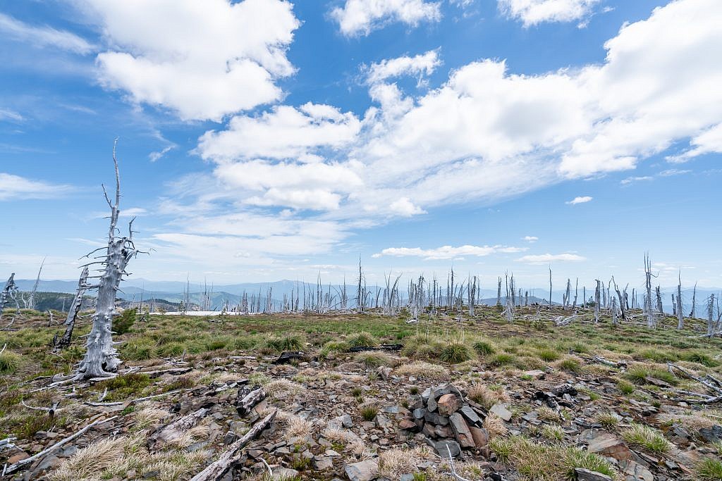 Cherry Peak summit. Be sure to log your name in the summit register buried in the cairn!