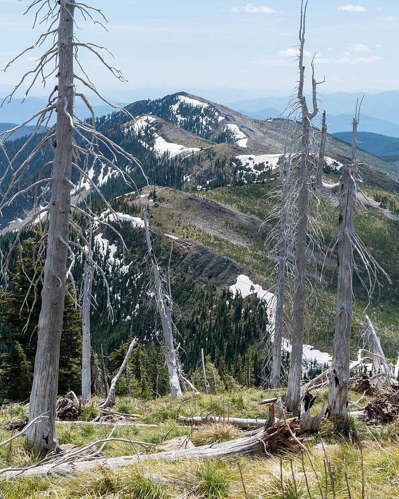 Penrose Peak would be a moderately difficult side quest. It looks like you can simply follow the ridge south to the summit.