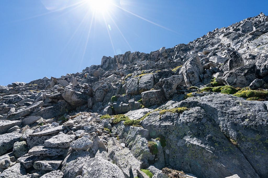 After about 1,000′ of vertical the terrain transitions into a straight-up boulder field. The boulders are large and stable which makes the ascent quite fun.