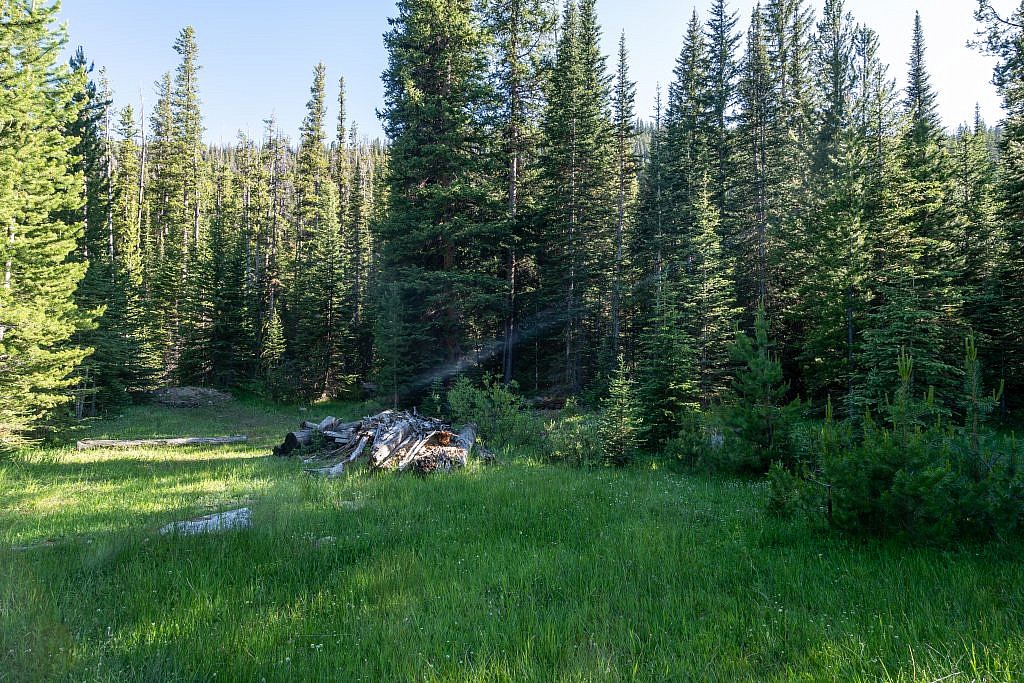 The clearing just before the official Barb Lakes trailhead. From here cross Gorge Creek, bushwhack up the steep hill in front of you, sidehill around to the DuBois Creek draiange. Then head west, following a series of rock markers all the way to Barb Lake. From there it’s simple climb to the top.